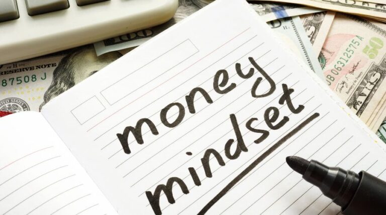 The words Money Mindset written in a notebook